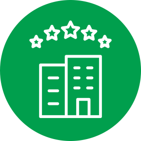 Icon of two buildings and five stars inside of a green circle